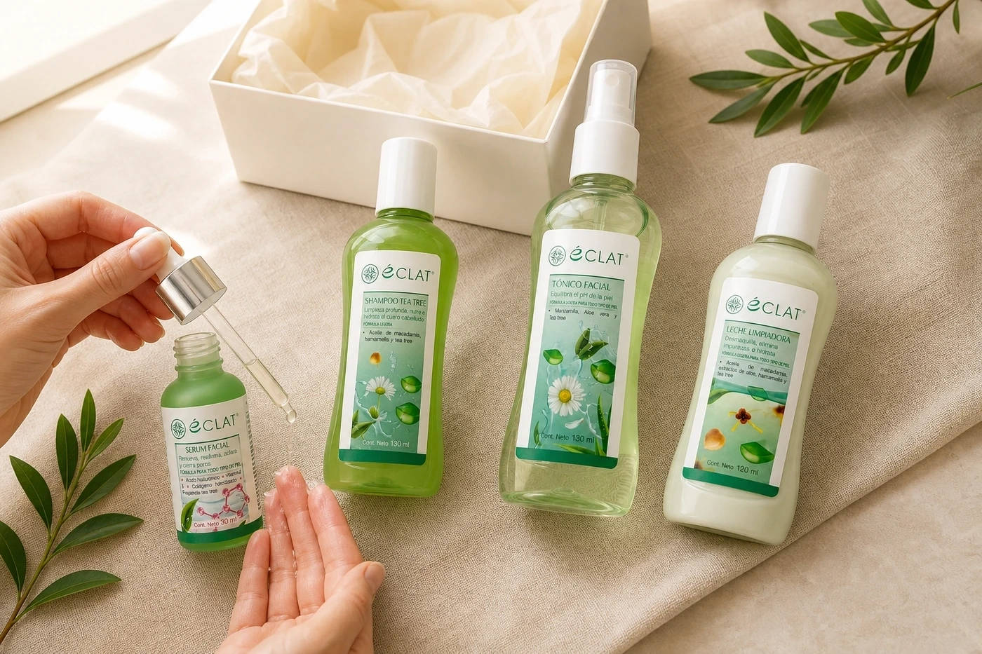 Cofre de Tea Tree Éclat en flat lay editorial con ritual de sérum